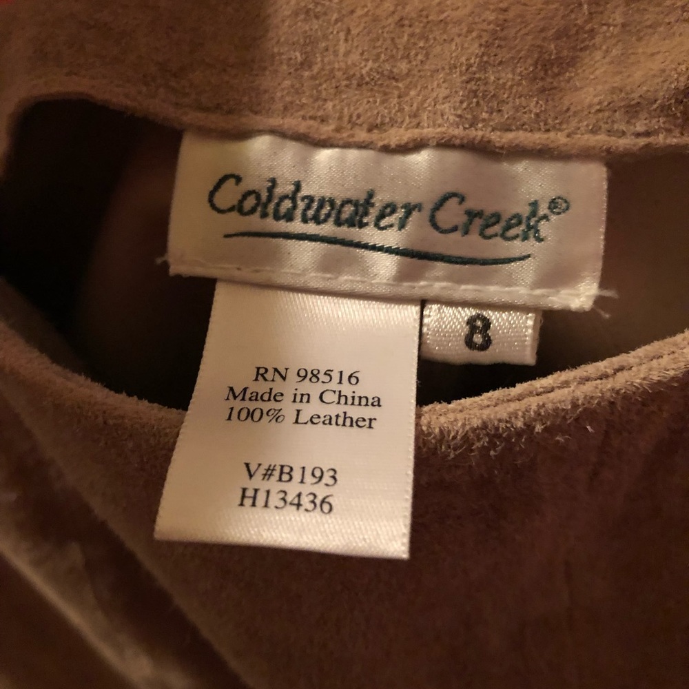 Tan, long genuine suede skirt.